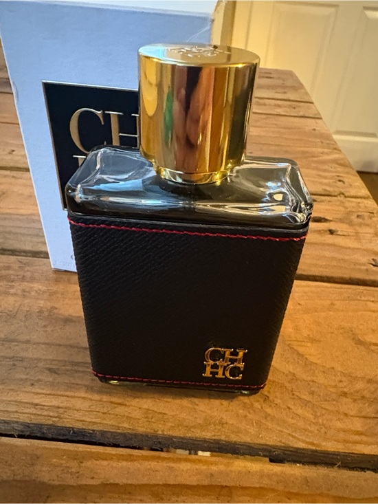 Carolina Herrera Other - Carolina Herrera CH Men Black Leather Bottle with Gold Cap and Red Stitching